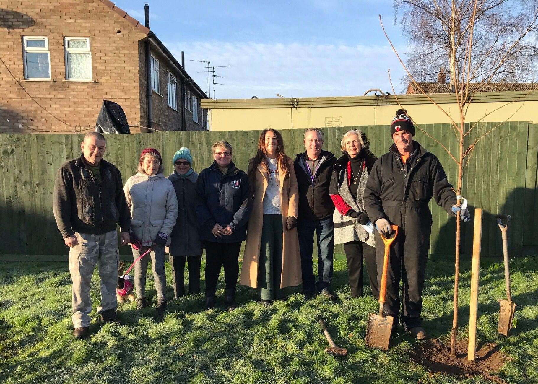 Whittlesey councillors dig in the plant one of the cherry trees in their town. (54261213)