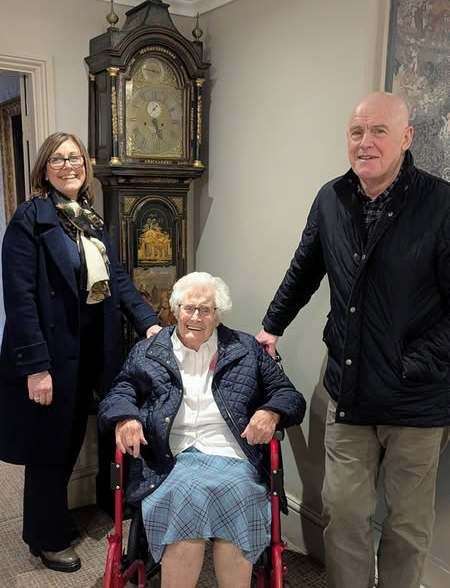 Betty and her family at the clock she remembers