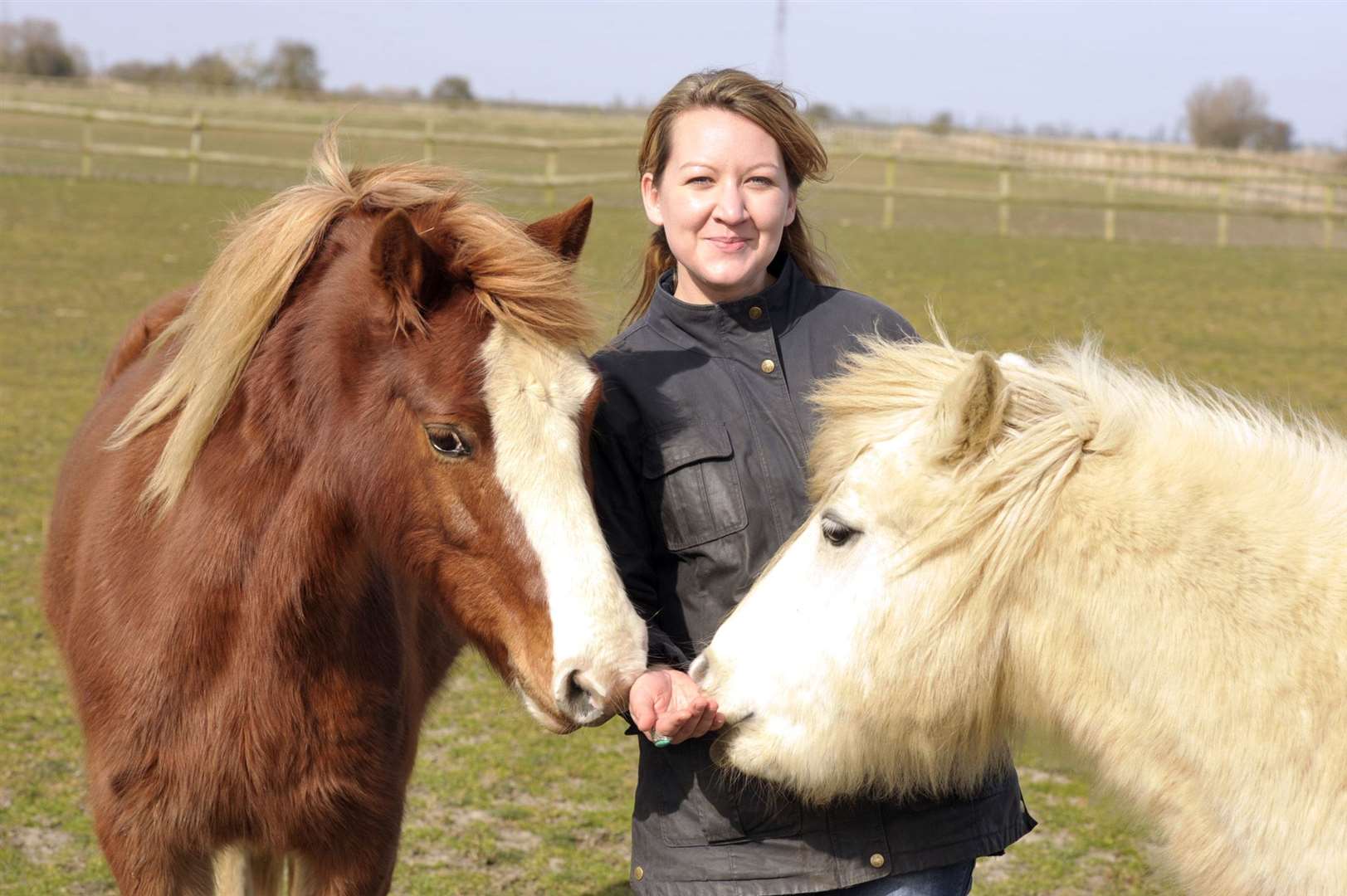 Katie Bristow with Biccy and Rascal - the community farm is still helping people's mental well-being during the coronavirus outbreak.