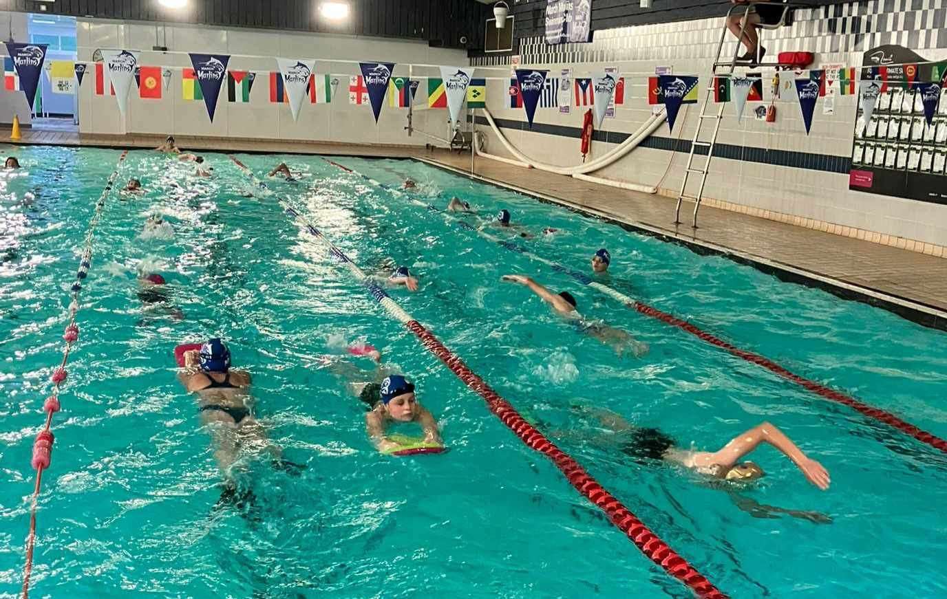 March Marlins swimmers during their sponsored swim