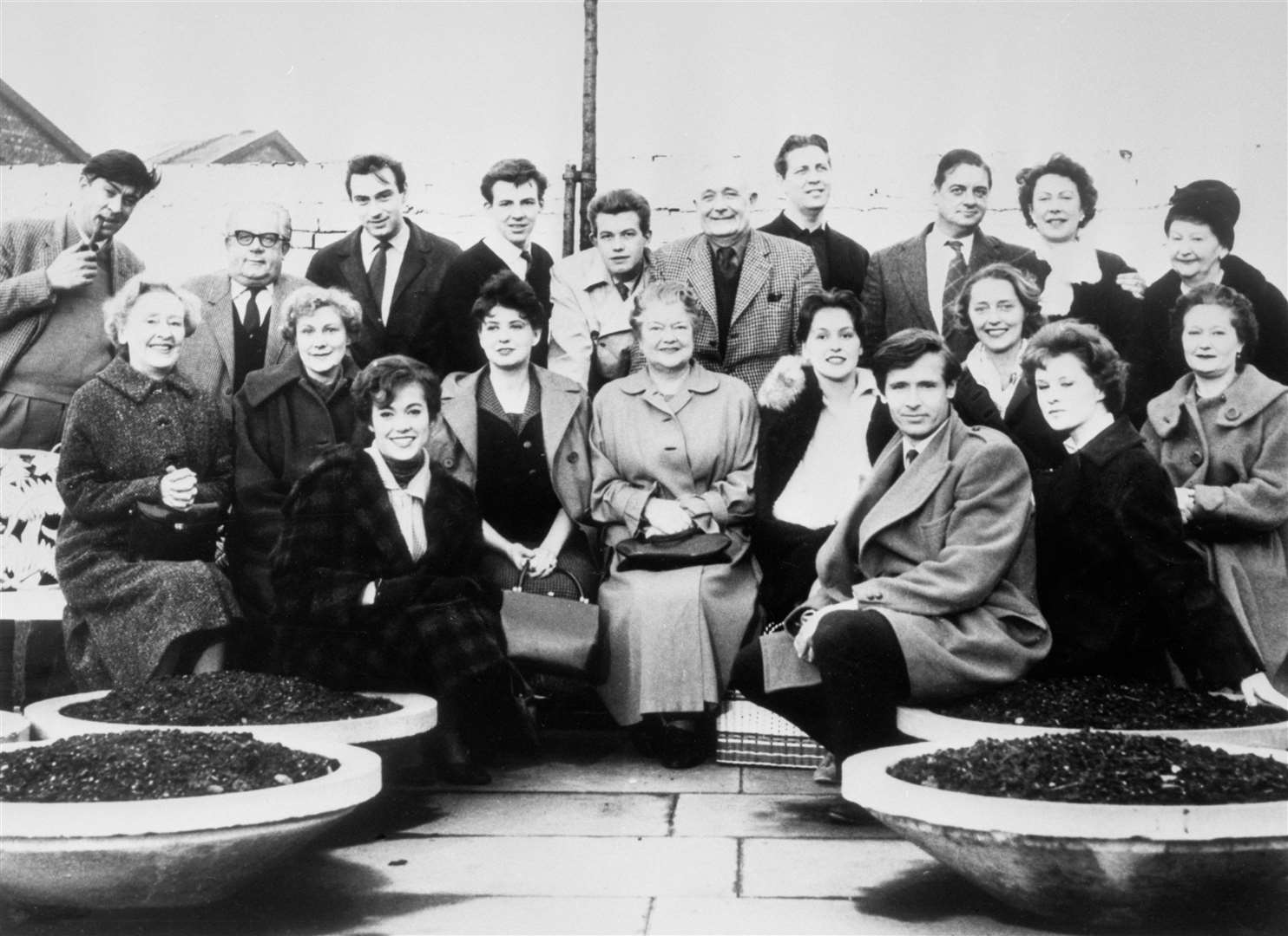 William Roache (back row, from left) and Philip Lowrie (Dennis Tanner) towards the end with Coronation Street cast members (PA)