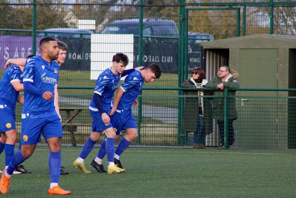 Harry Biggs is congratulated after scoring for March. Picture: Amber Kent