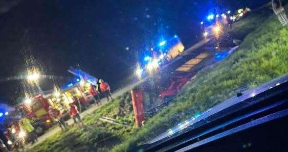 The overturned bus. Photo: Leah Smith