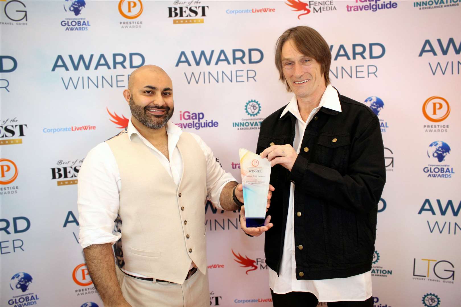 Tim receiving his award.