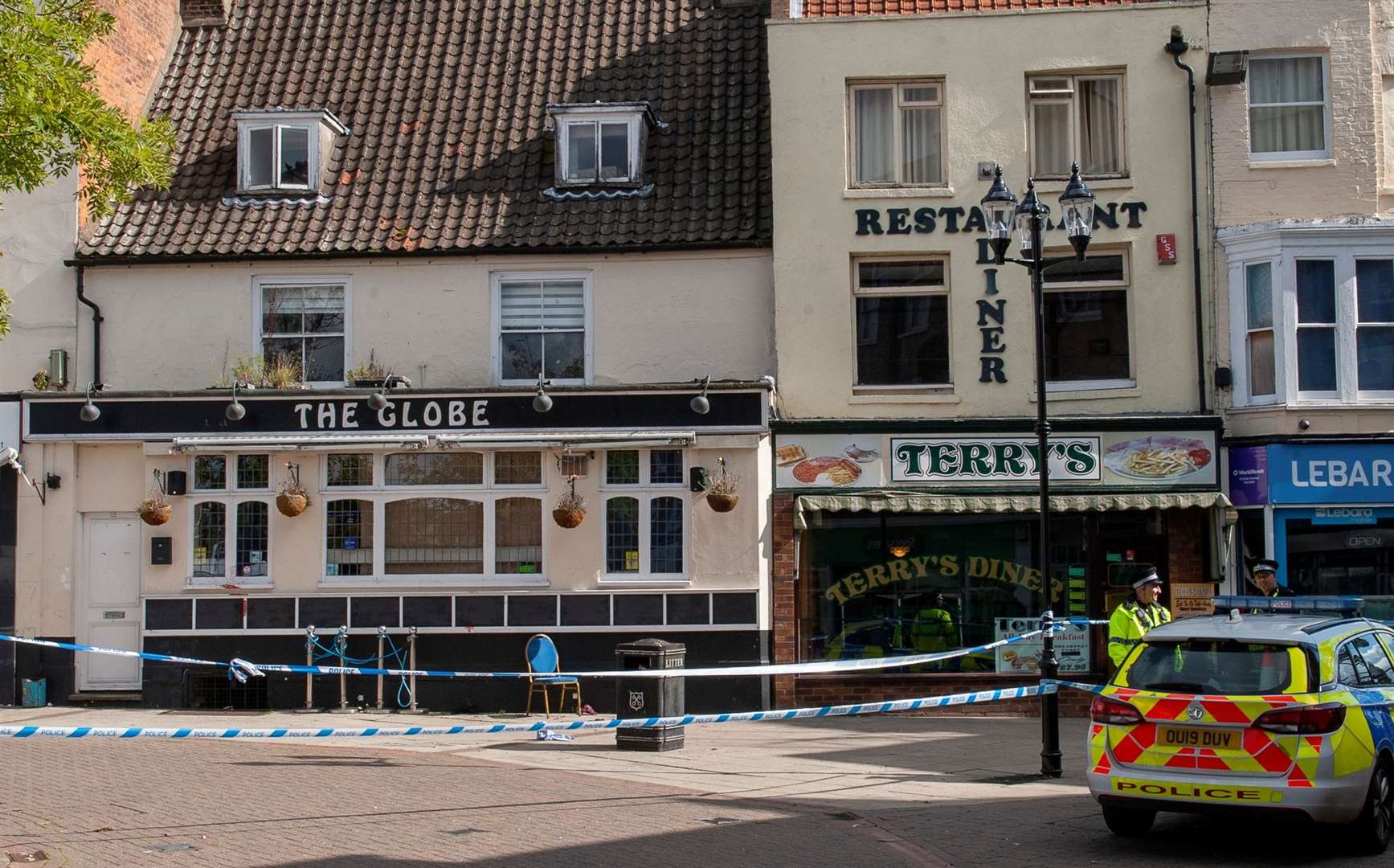 The area around The Globe in Wisbech's Market Place has been taped off today. Pictures: Michael Fysh