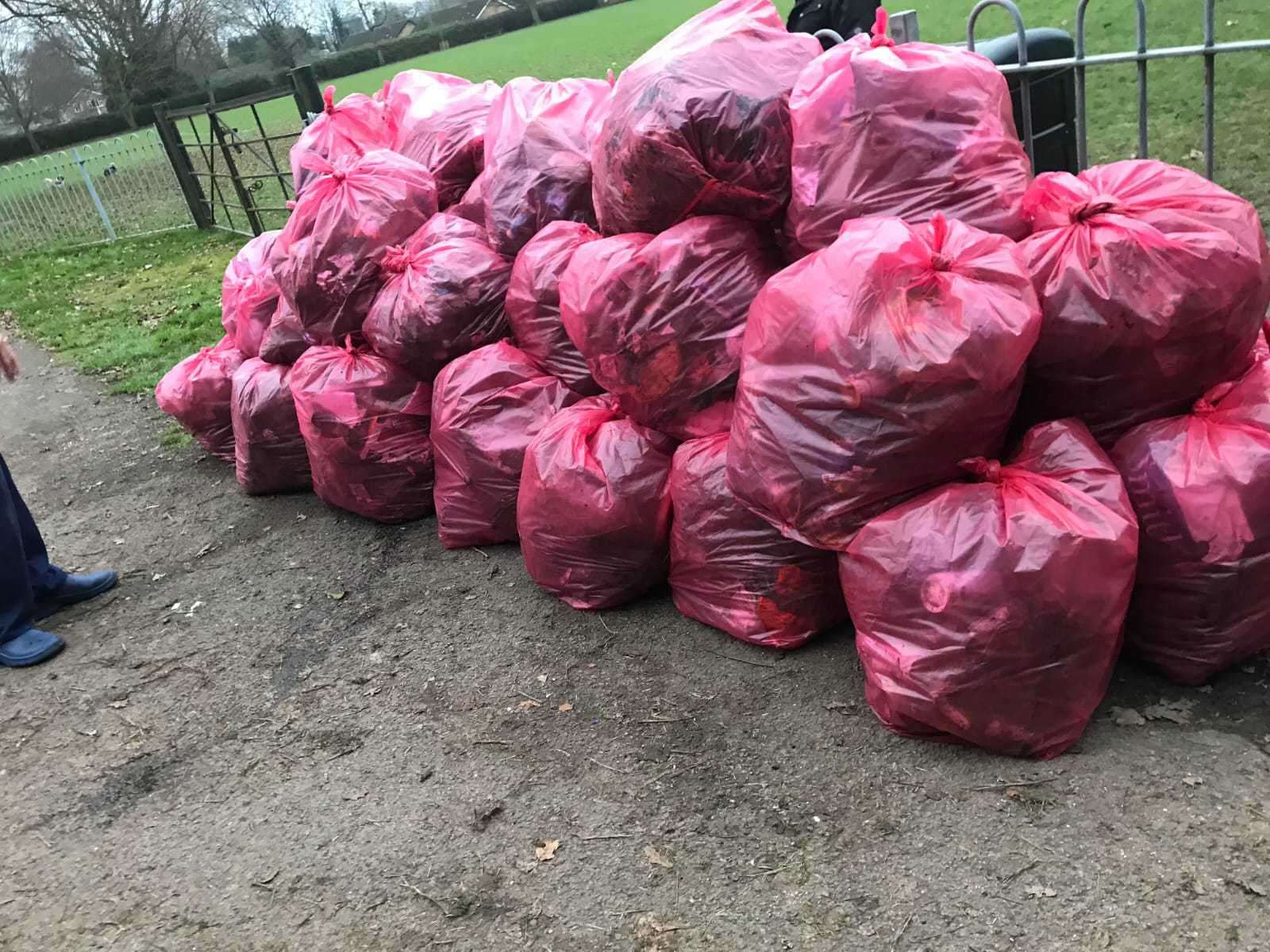 McDonalds at Long Sutton donates Andy and Deanne red refuse sacks which they like because they are strong bags
