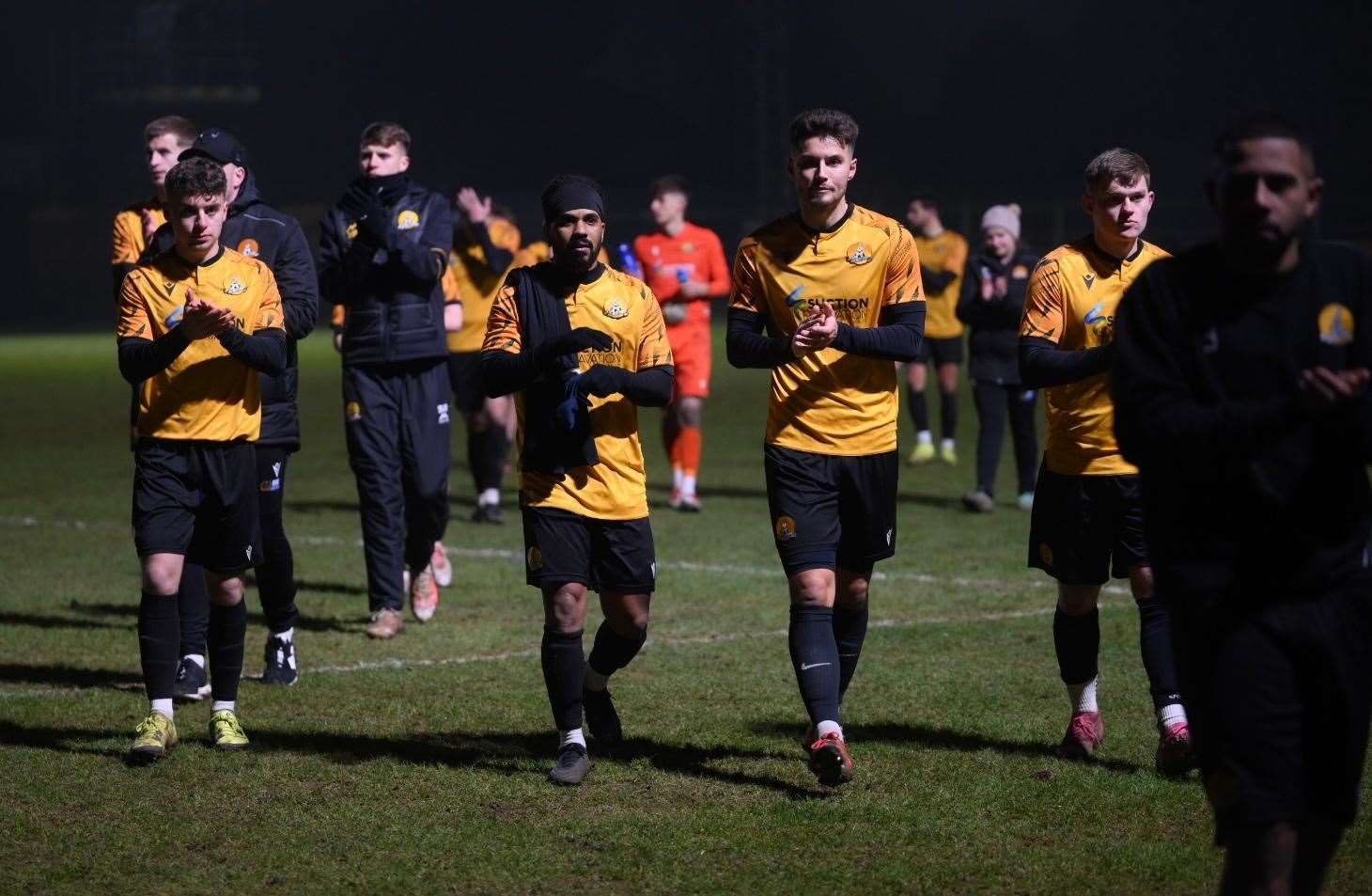 Dejected March players leave the pitch