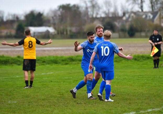 Action from the game between Outwell Swifts (blue) and March Town A (black and amber). Picture: Andrew Lister