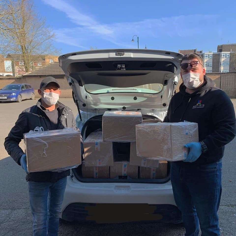 Spike (left) and volunteer Blake Heron prepare to deliver boxes to the most vulnerable hit by the coronavirus pandemic in Wisbech. (32504768)