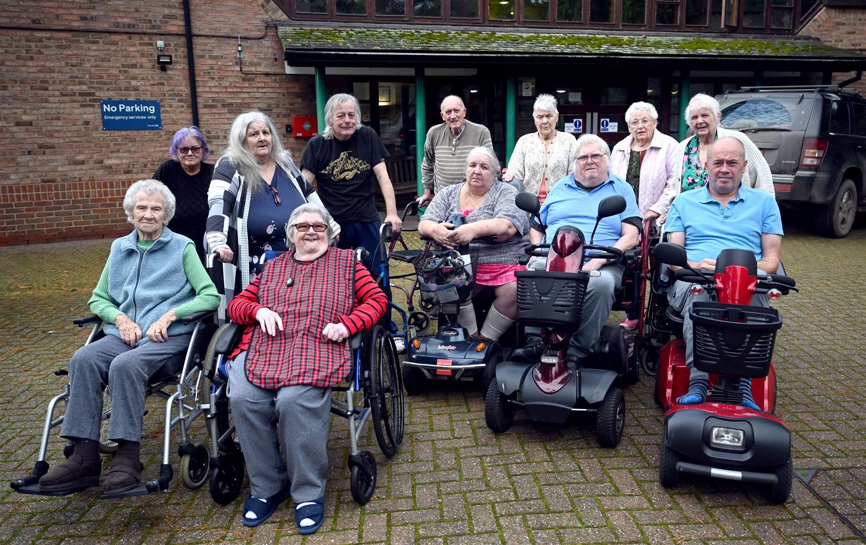 Residents outside of Somers Court where they have been told that it is due to close
