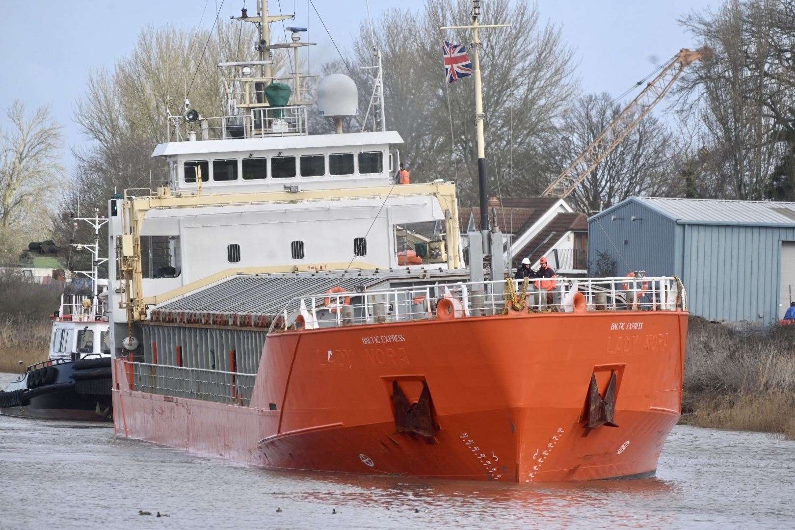 Boat that was stuck between Sutton Bridge and Wisbech. Being pushed into Wisbech port. (62657542)