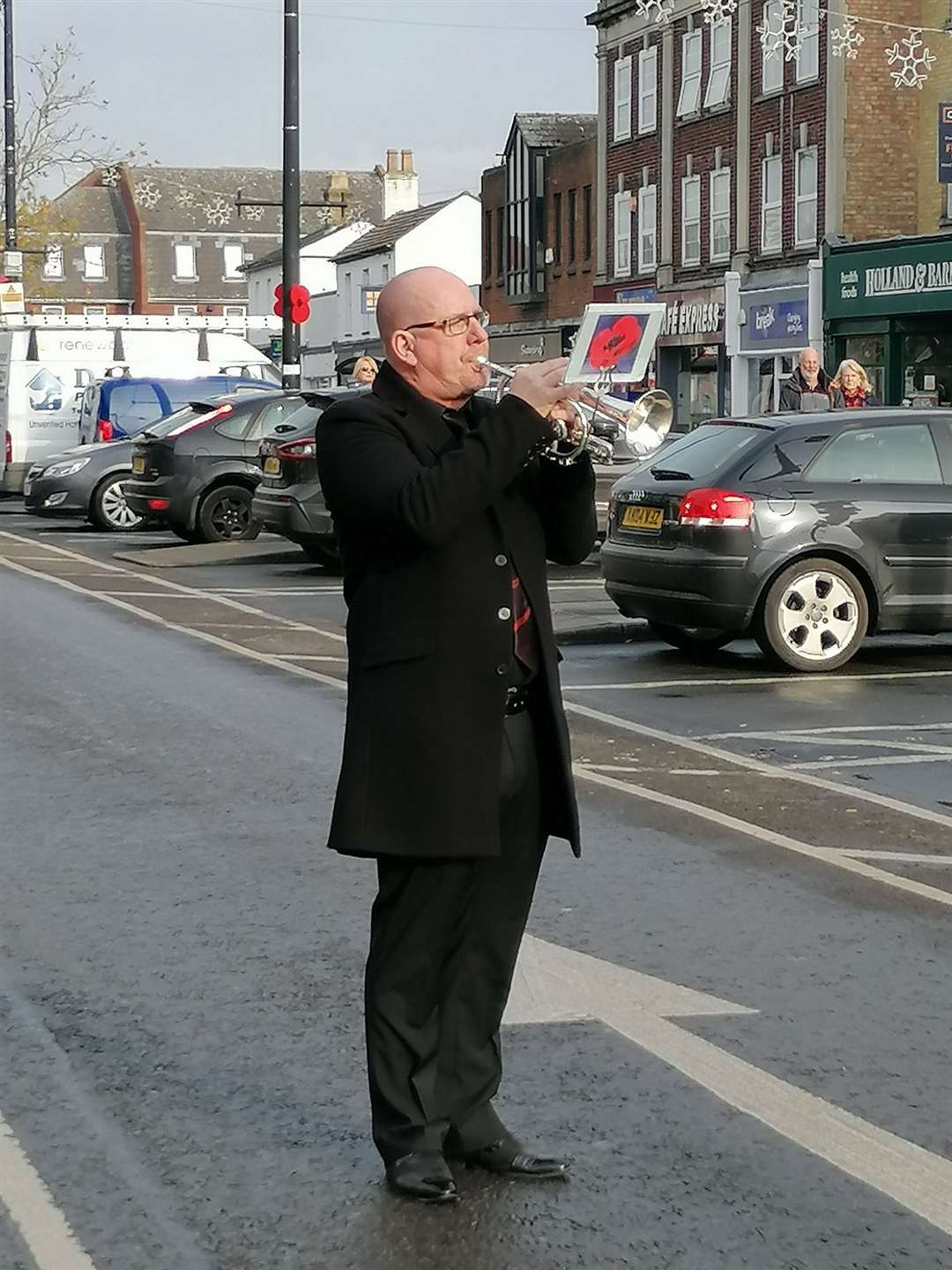Nigel Sutterby was bugler at the town's war memorial playing the 'Last Post' and 'Reveille' s other buglers played at locations around the town. (43029772)