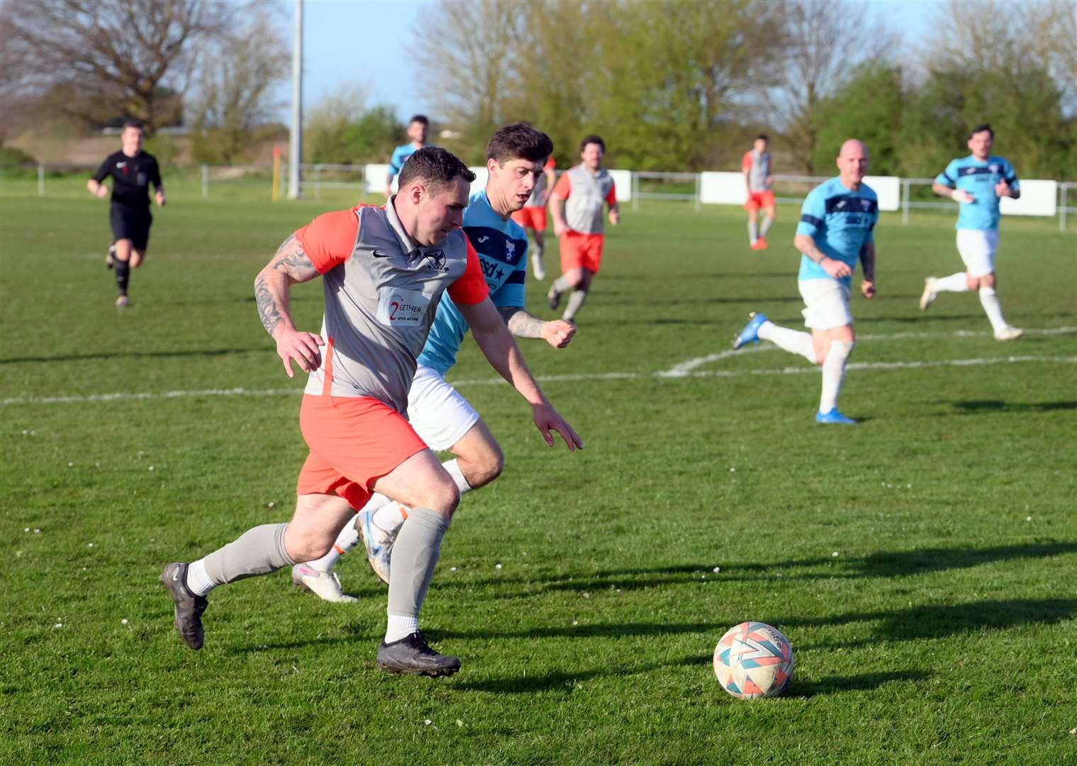 Parson Drove (grey and orange) v Holland (blue). Brad Easey