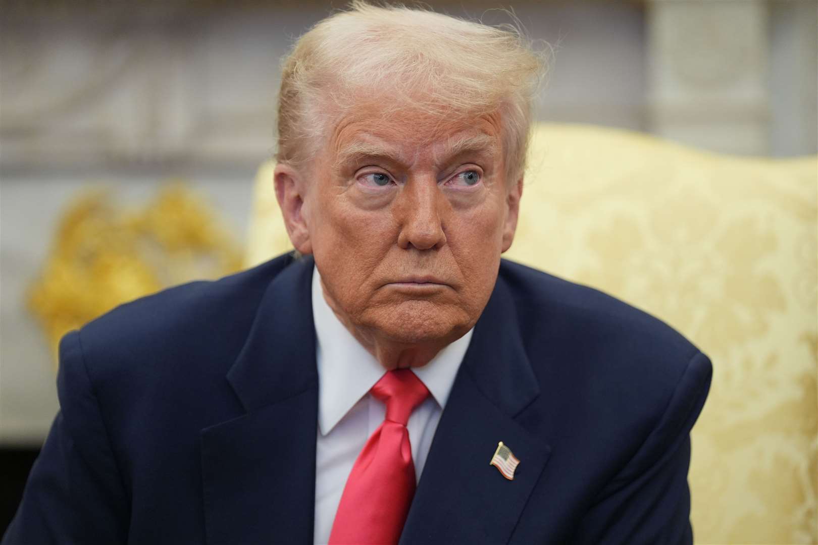 Donald Trump has imposed a minimum 10% tariff on all UK goods to the US (Niall Carson/PA)