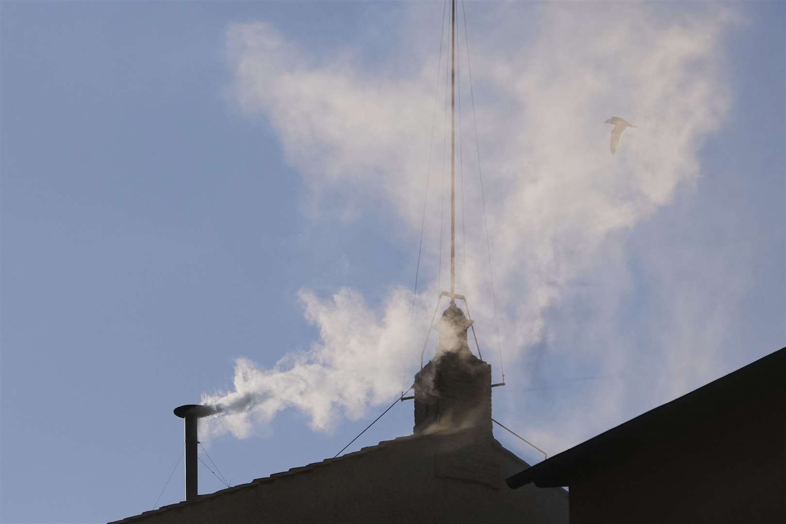 White smoke billows from the chimney of the Sistine Chapel (Alessandra Tarantino/AP)