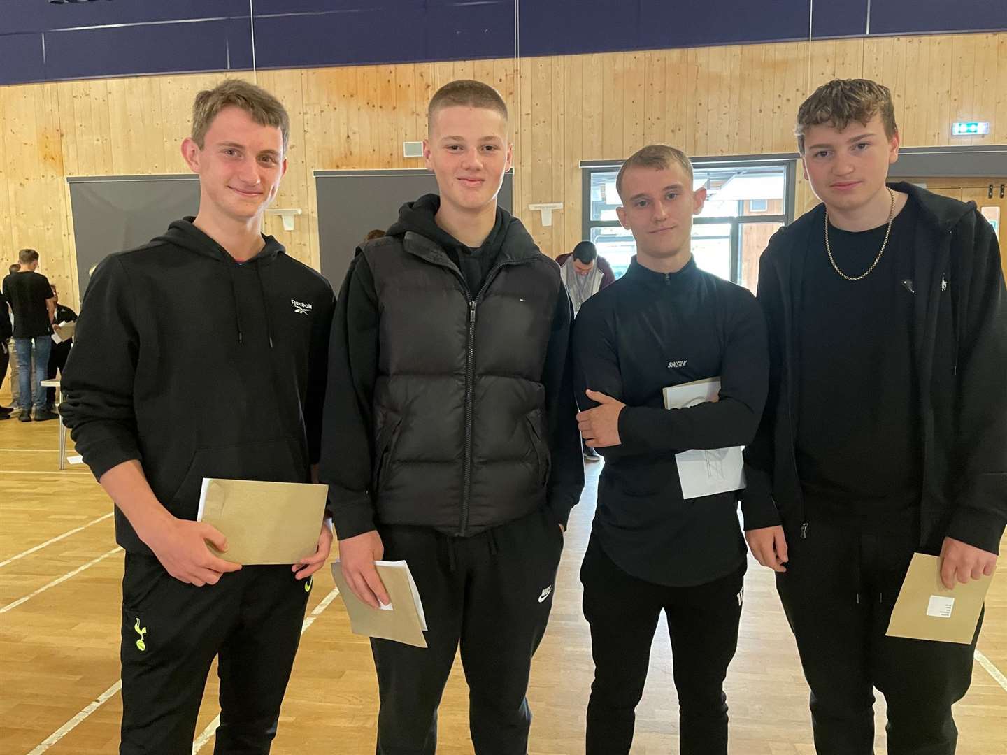Neale-Wade students from left Sam Keenoy, Alfie Wilby, Piotr Ziabka, and Oscar Morris with their results. Picture: Sarah Cliss.