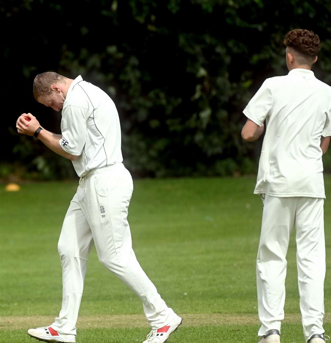 Tom Freear taking a caught and bowled for Wisbech 3rds v Telugu 3rds