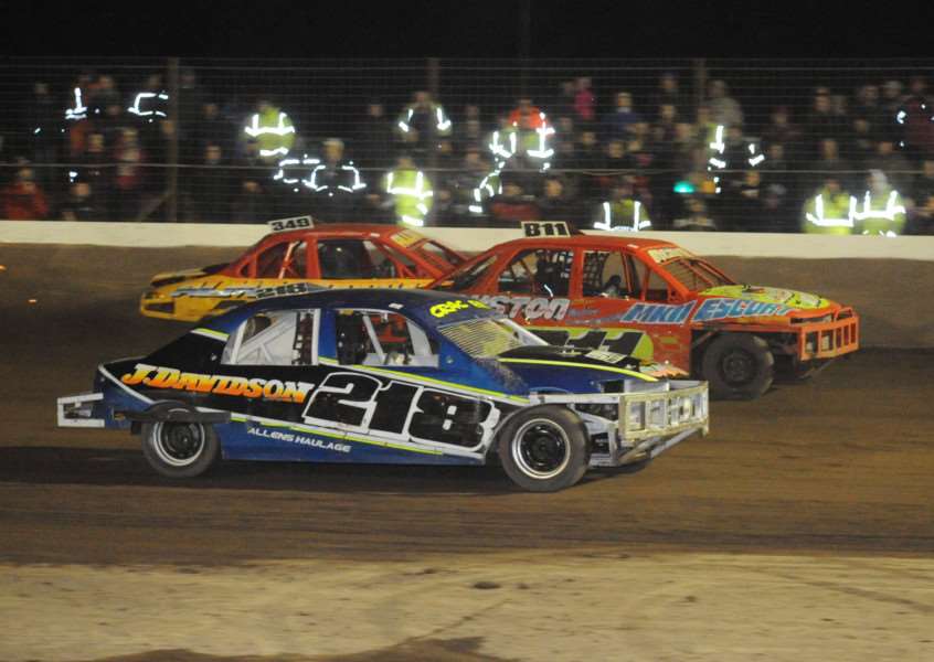 Wisbech star Jacob Downey (Car 218) battles his way to the front yet again in the 2L Stock Cars