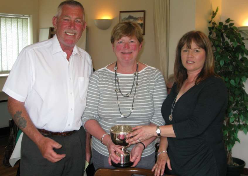 MFCP March Golf Ladies v Seniors'The photograph shows Bruce Frost (senior captain) and Fiona Wood receiving the trophy from the ladies Captain Shona Kent (centre).