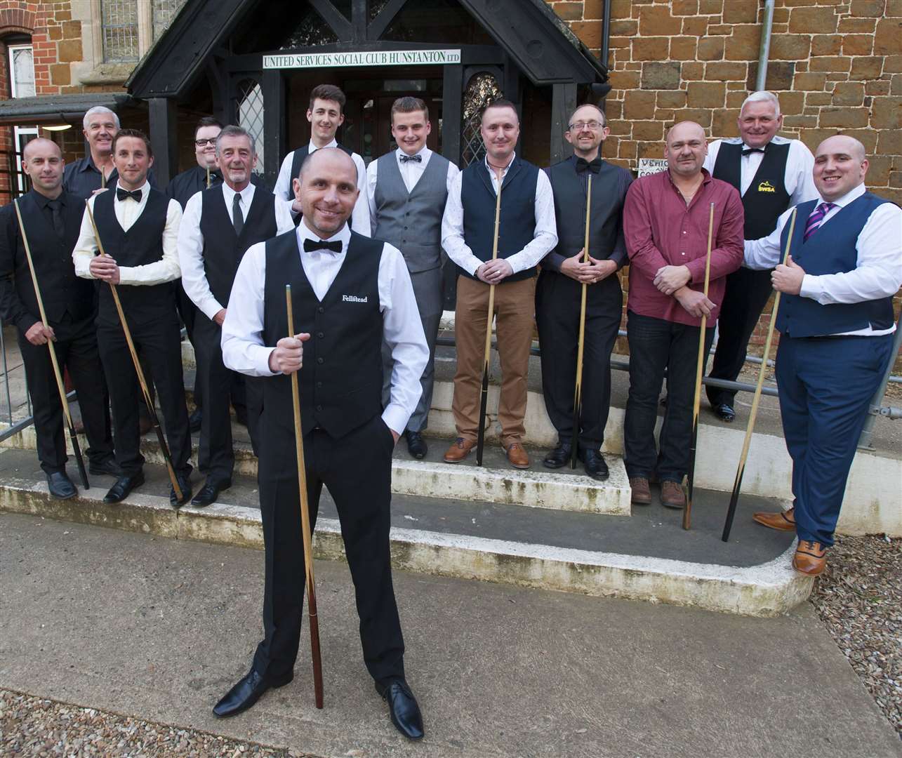 Professional snooker player Joe Perry, front, centre.