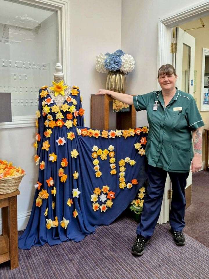 Carer Julie Price pictured with part of the display