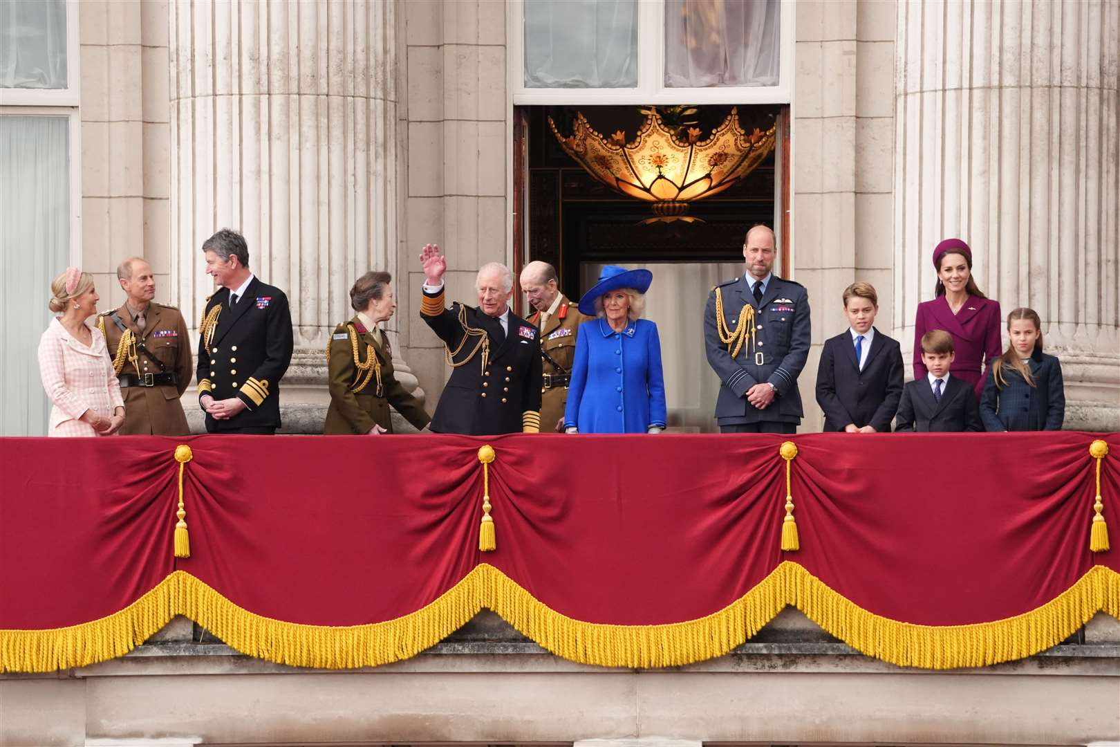 The Duchess of Edinburgh, the Duke of Edinburgh, Vice Admiral Sir Tim Laurence, the Princess Royal, the King, the Duke of Kent, the Queen, the Prince of Wales, Prince George, the Princess of Wales, Prince Louis and Princess Charlotte on the balcony of Buckingham Palace (Jonathan Brady/PA)