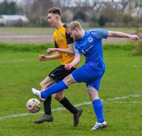 Action from the game between Outwell Swifts (blue) and March Town A (black and amber). Picture: Andrew Lister