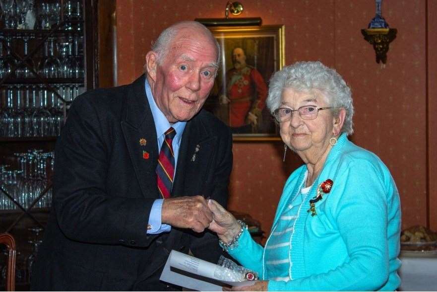 Freda Aspinall receives her 30 year award from President Leon Jones