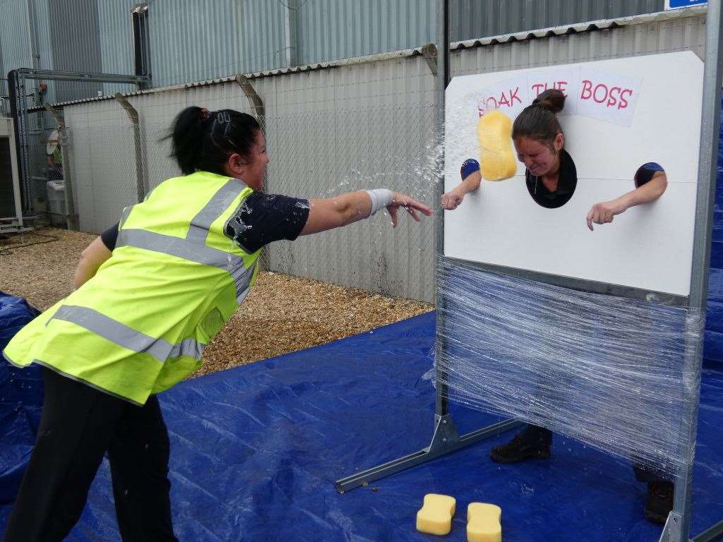 Senior staff at DHL in Wisbech got a soaking from employees for charity. (15437891)