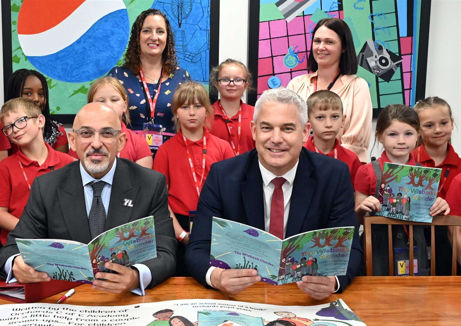 Orchards School visit to Department of Education to show the Secretary of State for Education Nadhim Zahawi a book that has been produced by the school. (57446758)