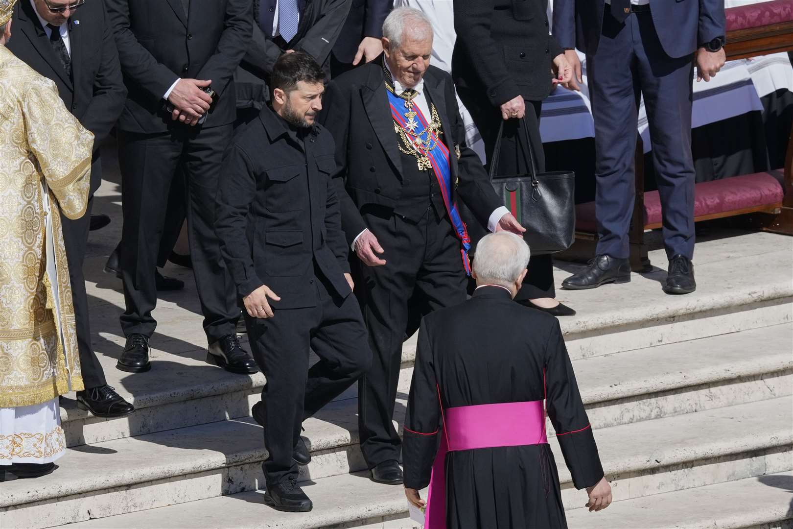 Ukraine’s President Volodymr Zelensky appeared to receive a round of applause from attendees as he emerged from the basilica (Gregorio Borgia/AP)