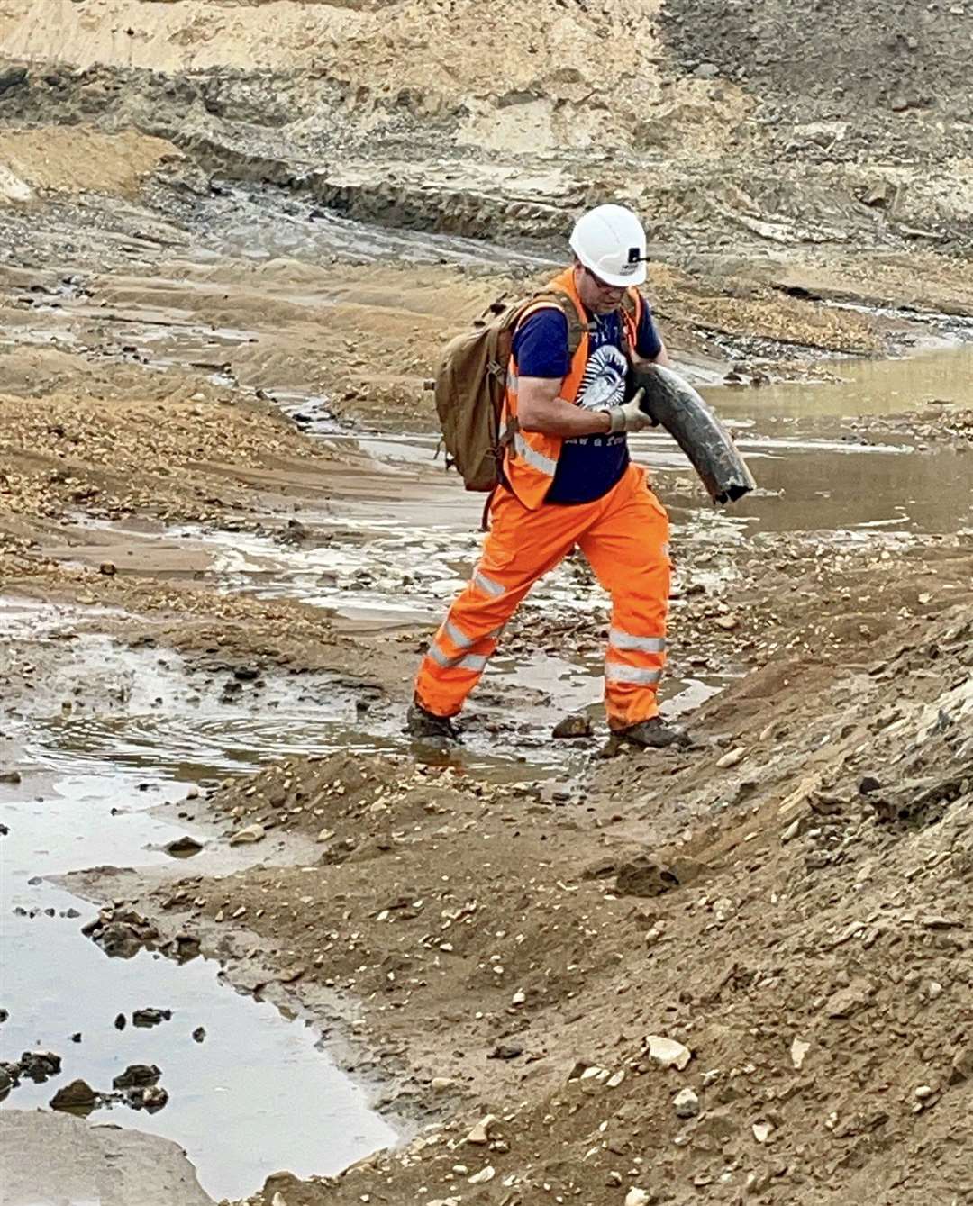 Veteran palaeontologist Jamie Jordan is celebrating a mammoth discover after finding a four-foot-long tusk in a quarry. Photos: SWNS.