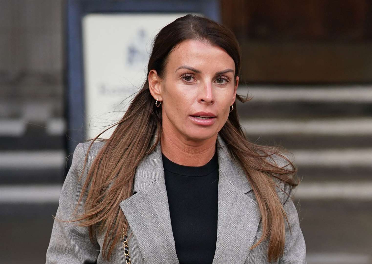 Coleen Rooney leaving the Royal Courts of Justice during the trial (Yui Mok/PA)