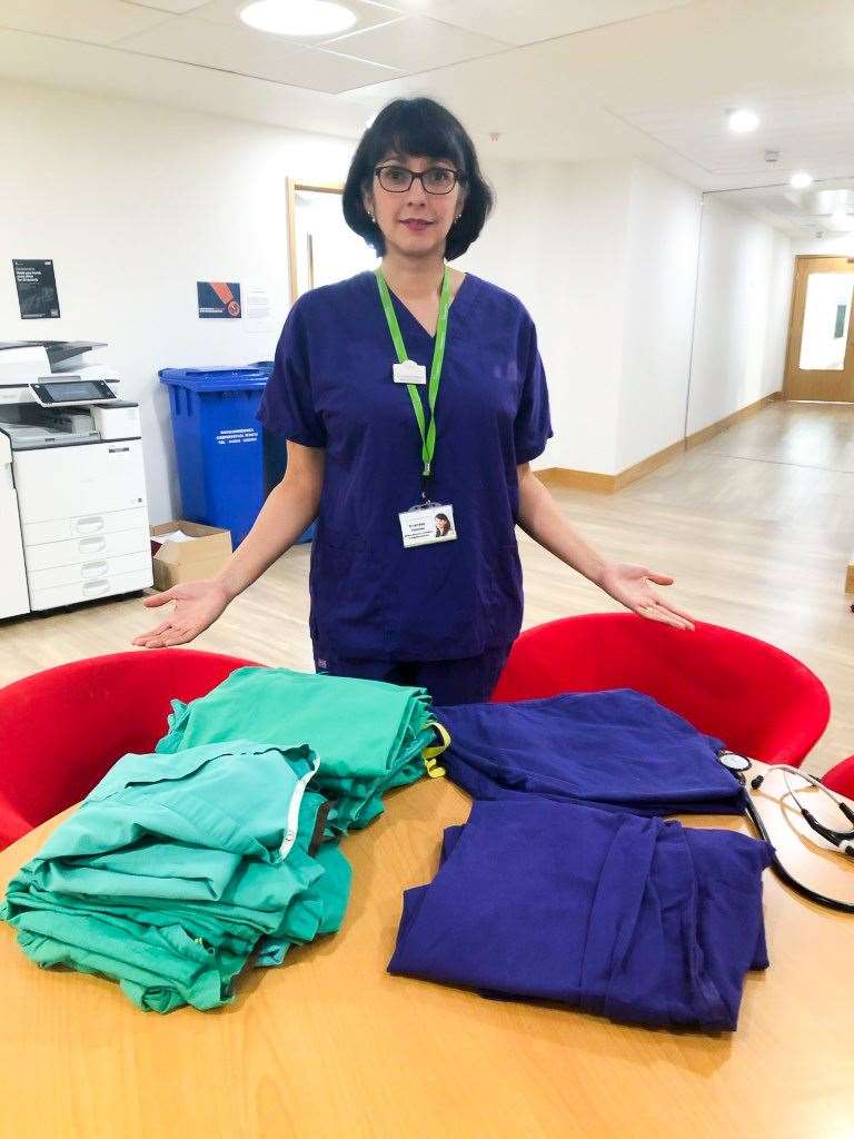 Lorraine Petersen, Medical Director, with scrubs. Local businesses have ralliedaround the Hospice, donating essential items such as PPE for clinical colleagues and iPadsfor patients enabling them to communicate with loved ones. (33216740)