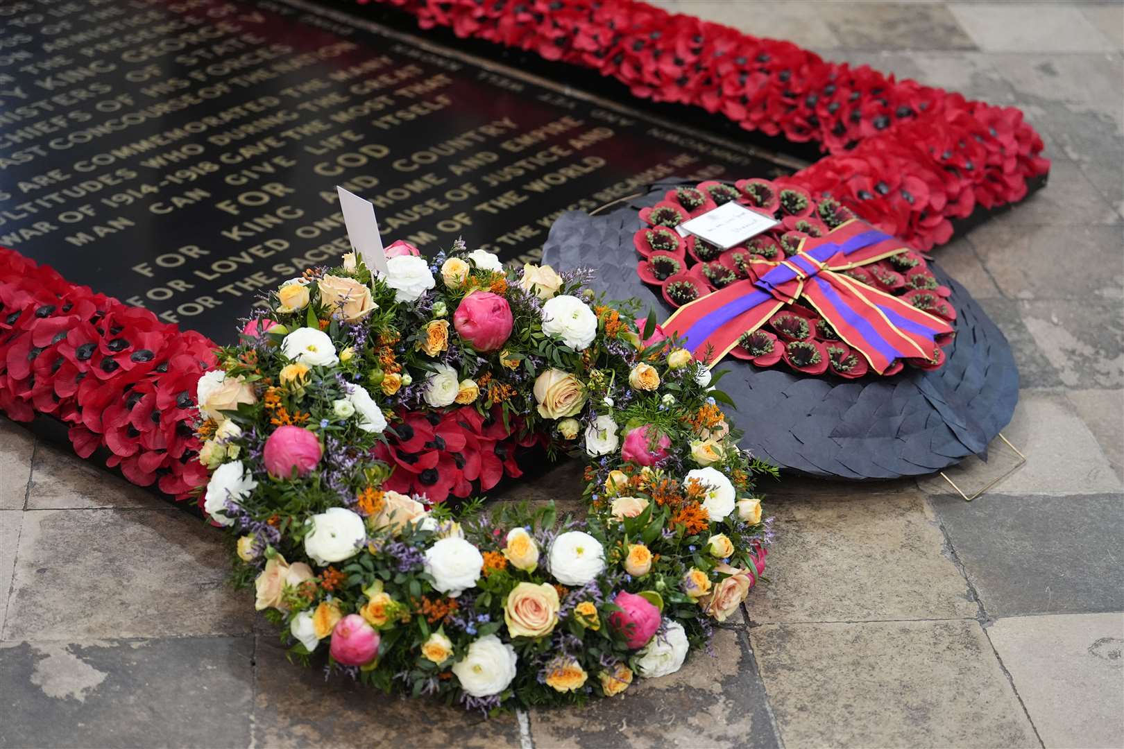 Wreaths laid by the King and the Prince of Wales at the Grave of the Unknown Warrior in Westminster Abbey (Jordan Pettitt/PA)