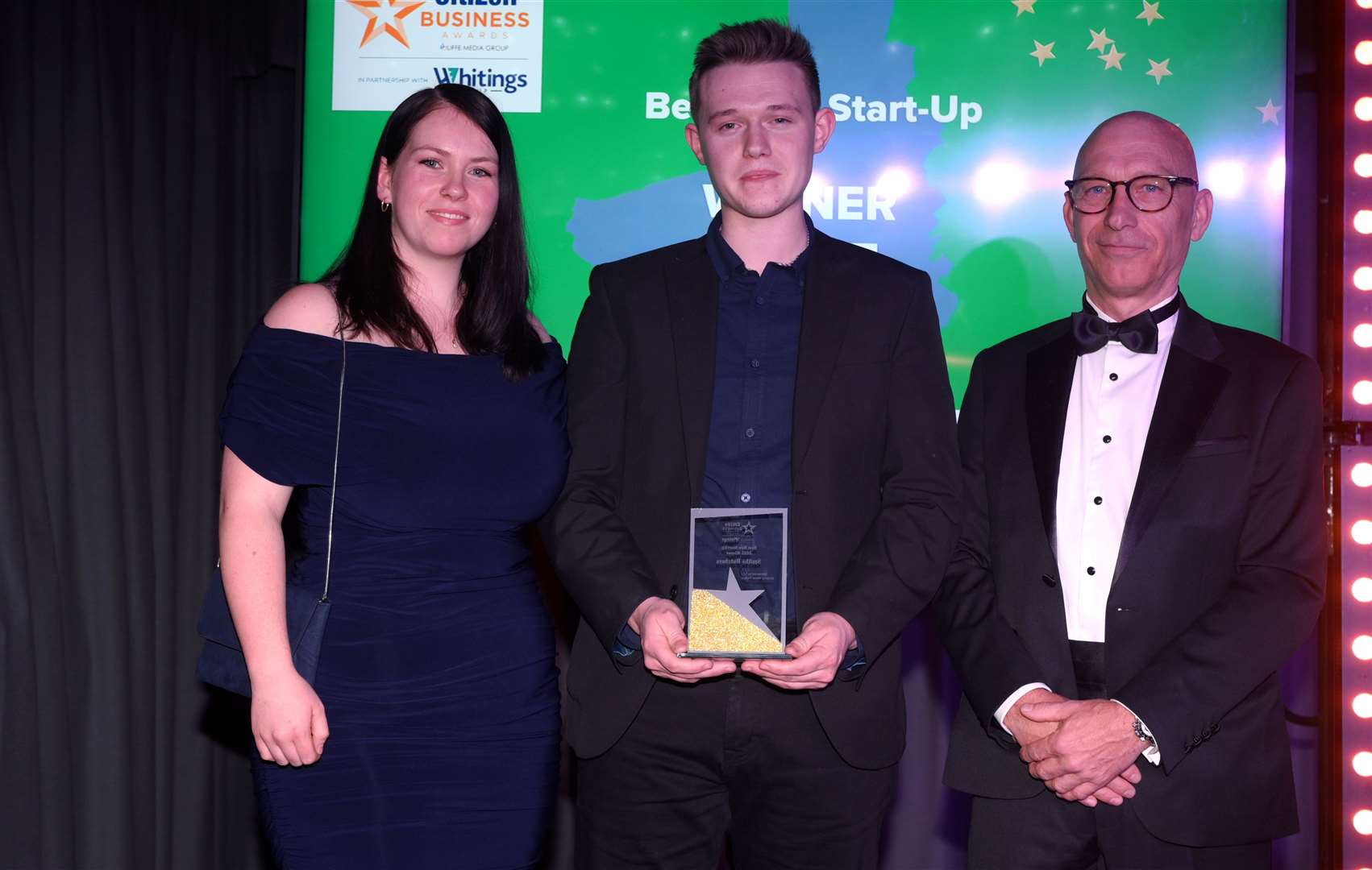 Fenland Citizen Business Awards 2025 Best New Start-Up winner Smiths Butchers - Jack Smith and his partner Nina were amazed to be presented with the award by Ian Smith, director of category sponsors Goldstar Metal Traders