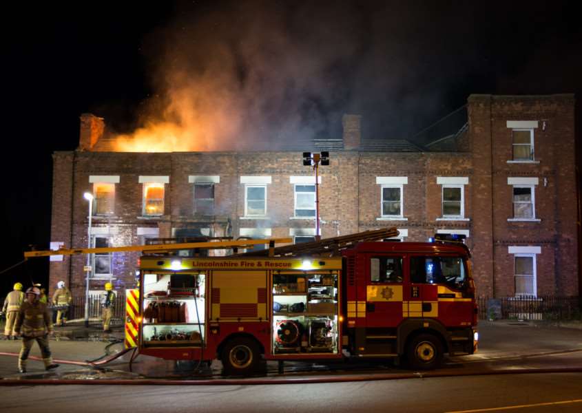The grim scene at the Bridge Hotel as flames leap past the roofline. Photo: Dave Hudson Photography. ANL-160814-132221001