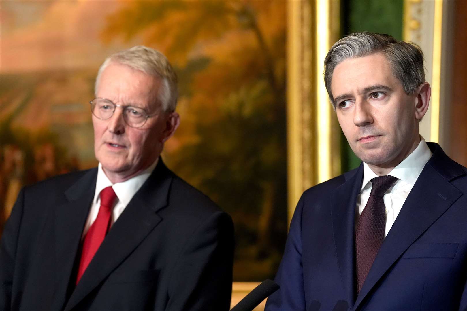 Secretary of State for Northern Ireland Hilary Benn and Tanaiste Simon Harris (PA)