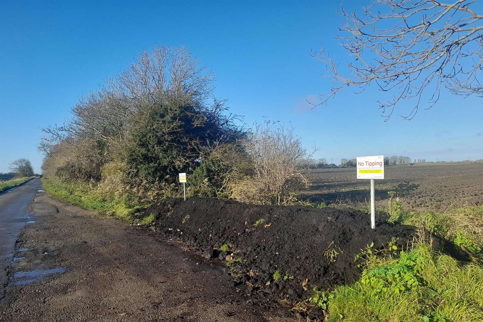 The site has been cleared and a soil and concrete bund put in place to deter fly-tippers.