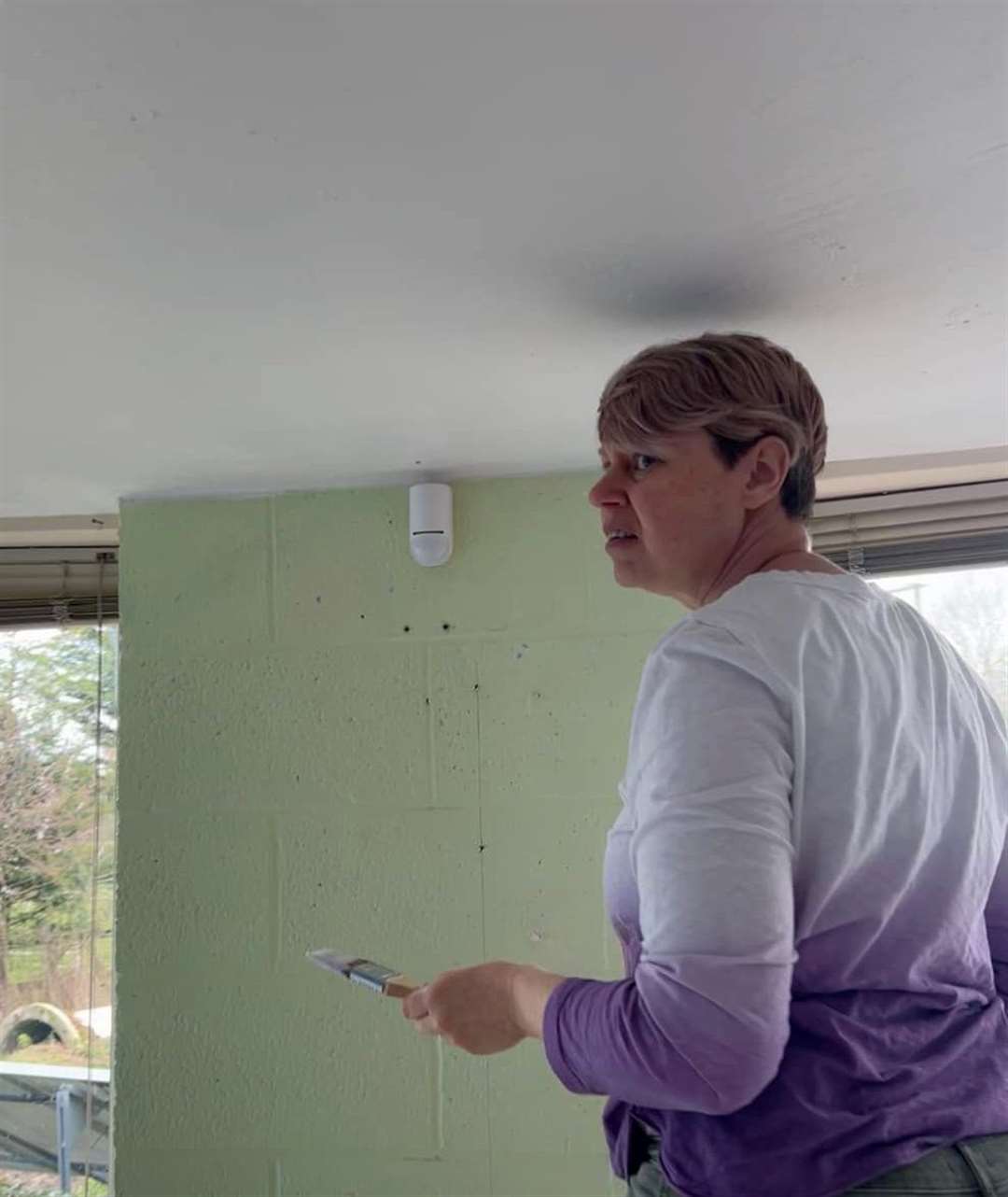 Hetty Hayes busy painting the unit which will open at the beginning of May
