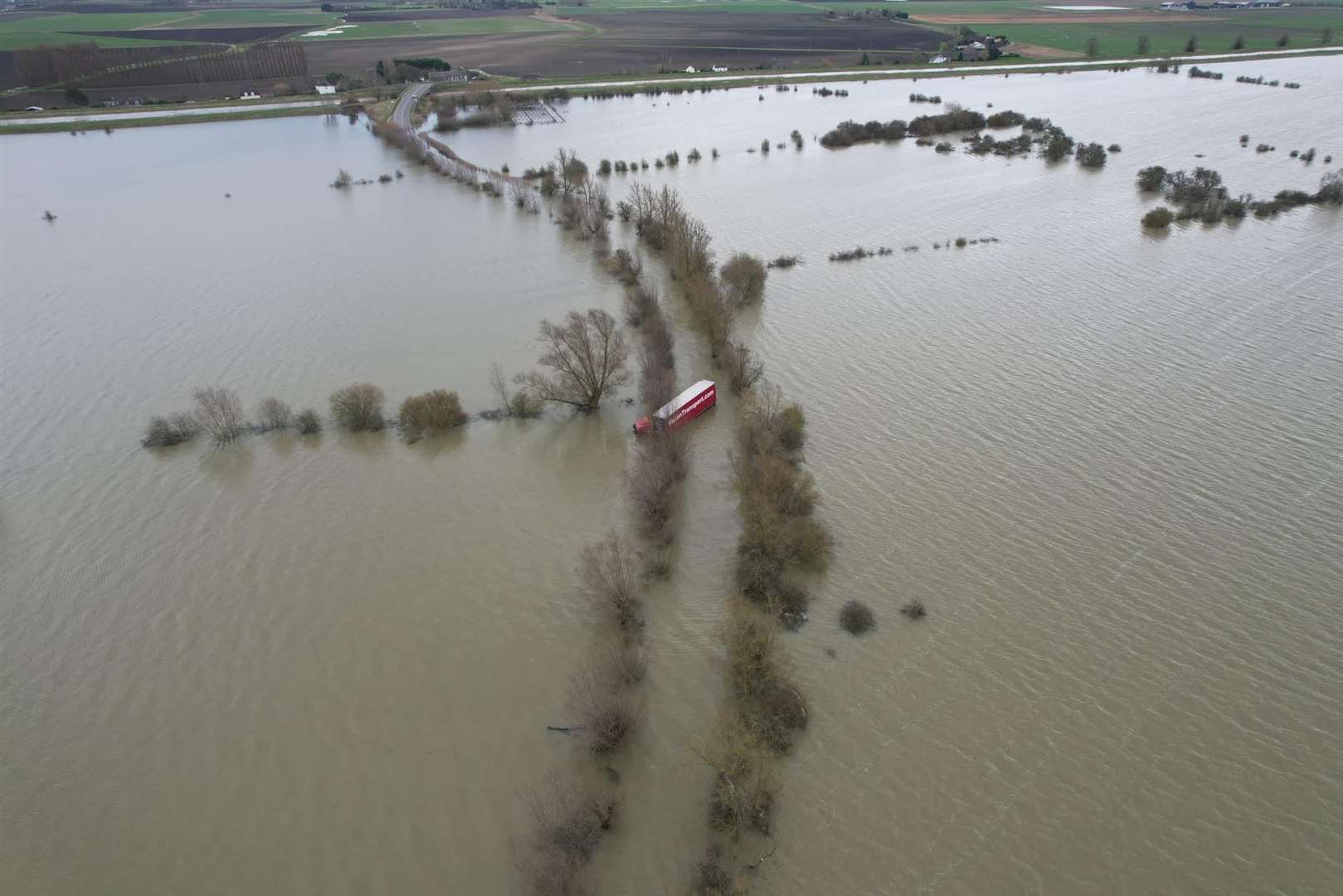 A lorry driver had to be rescued from their vehicle after it became stuck in flood water on Welney Wash Road. Picture: John Millward