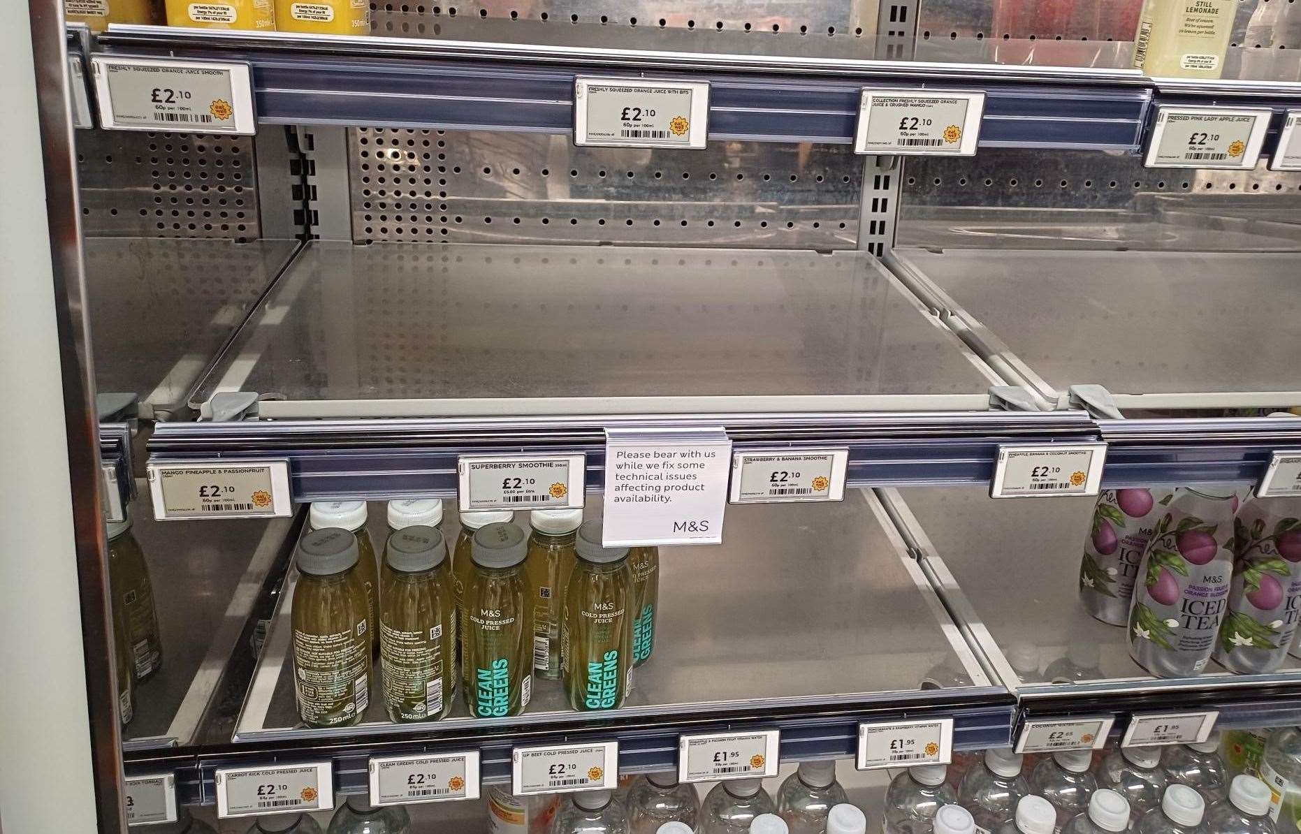 A view of empty shelves inside an M&S Food in Paddington, London (Holly Williams/PA)