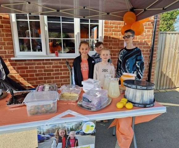 The Dodkin brothers pictured with Shyla Brown who recently ran a lemonade stand in aid of their fundraising.