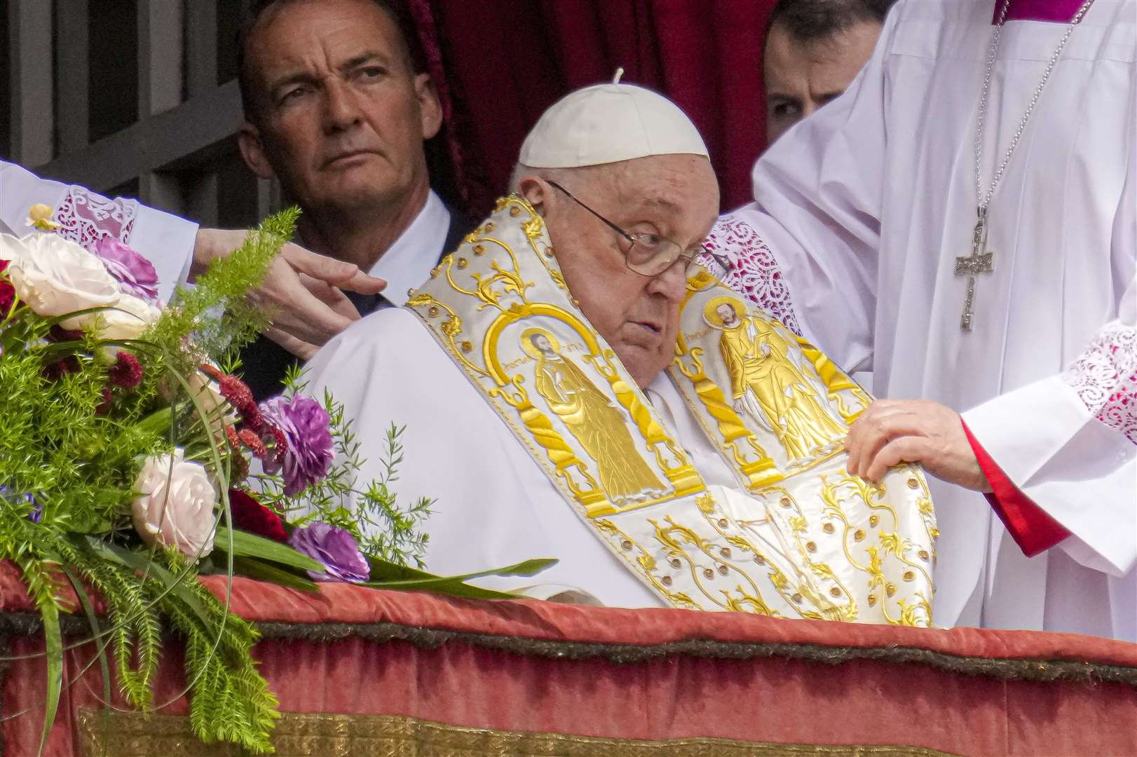 Pope Francis appeared on the central lodge of St Peter’s Basilica to bestow the Urbi et Orbi blessing on Easter Sunday (Gregorio Borgia/AP)