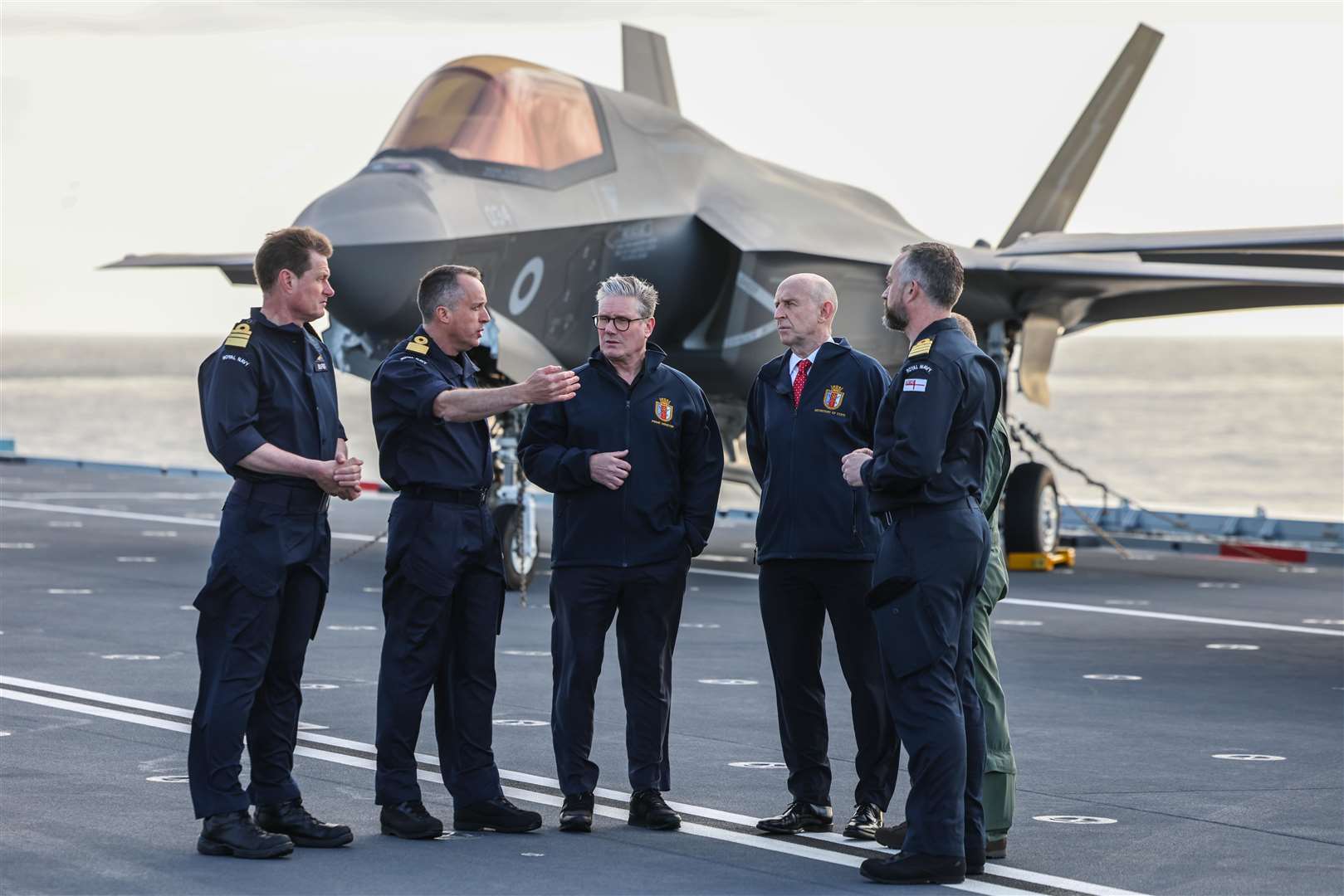The Prime Minister and Defence Secretary John Healey are shown the flight deck of HMS Prince of Wales (Richard Pohle/PA)