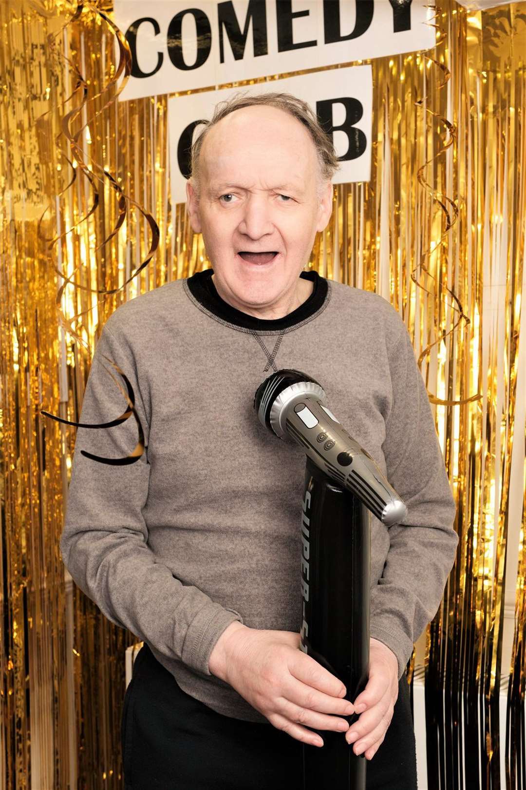 Resident Phillip Pikcles takes to the stage for his comedy act. (56472270)