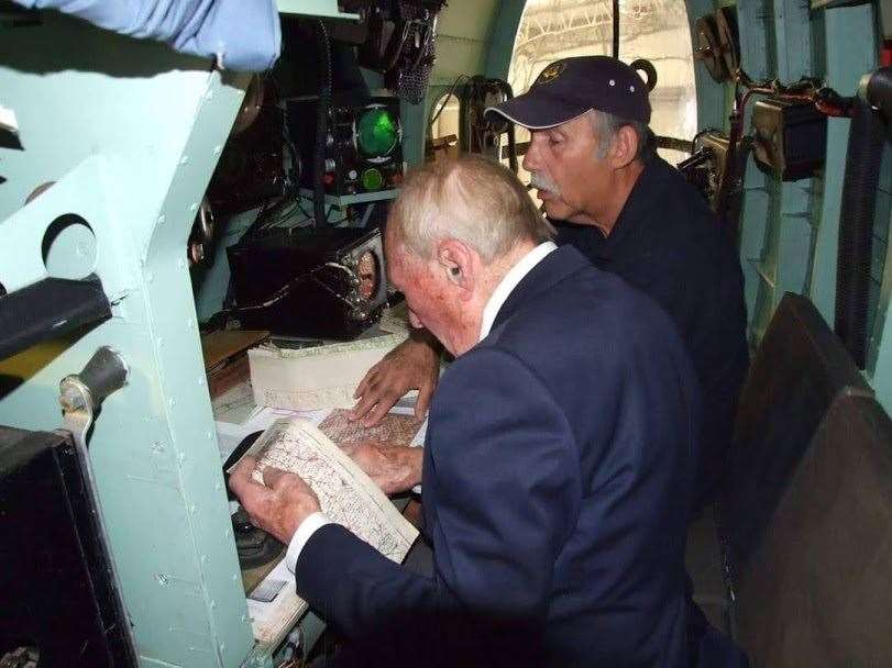 Henry sat in the navigator's seat on a Halifax bomber last year for the first time since being shot down. (42933794)