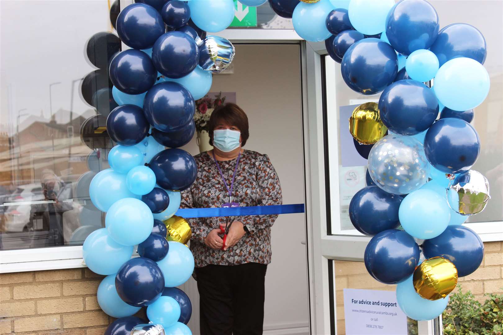 Cllr Sam Clark cuts the ribbon at the official opening of the new CARC office in Wisbech. (52255118)