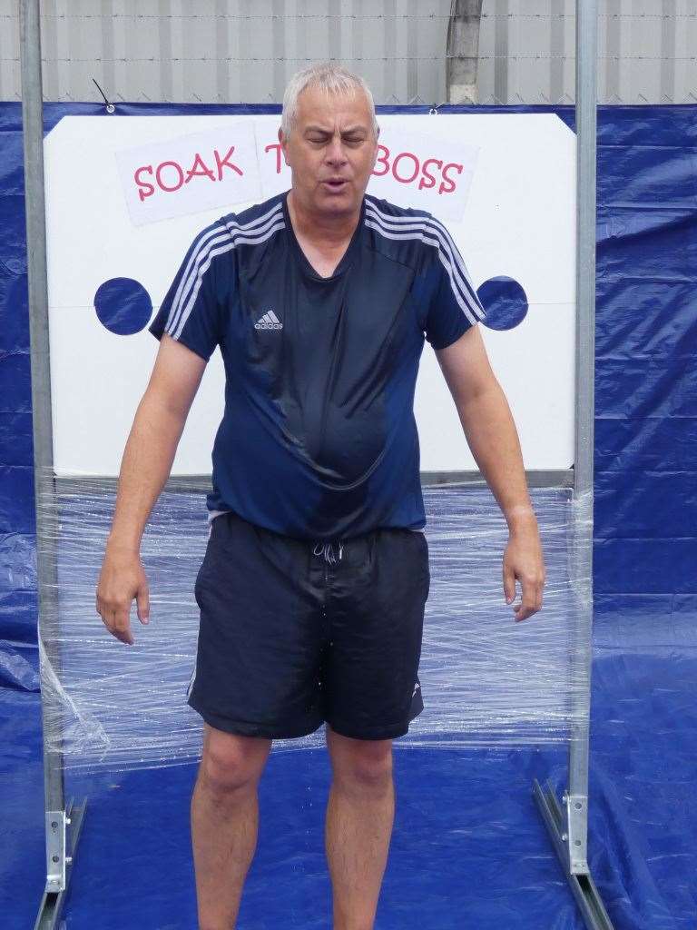 Senior staff at DHL in Wisbech got a soaking from employees for charity. (15437895)