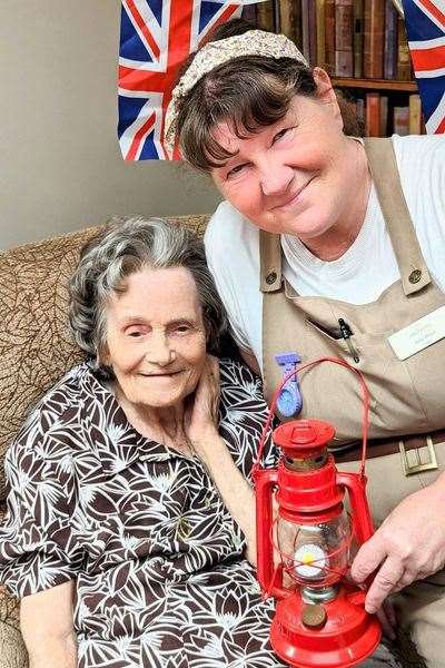 D-Day Lamp of Light with Hickathrift's oldest resident Norah.